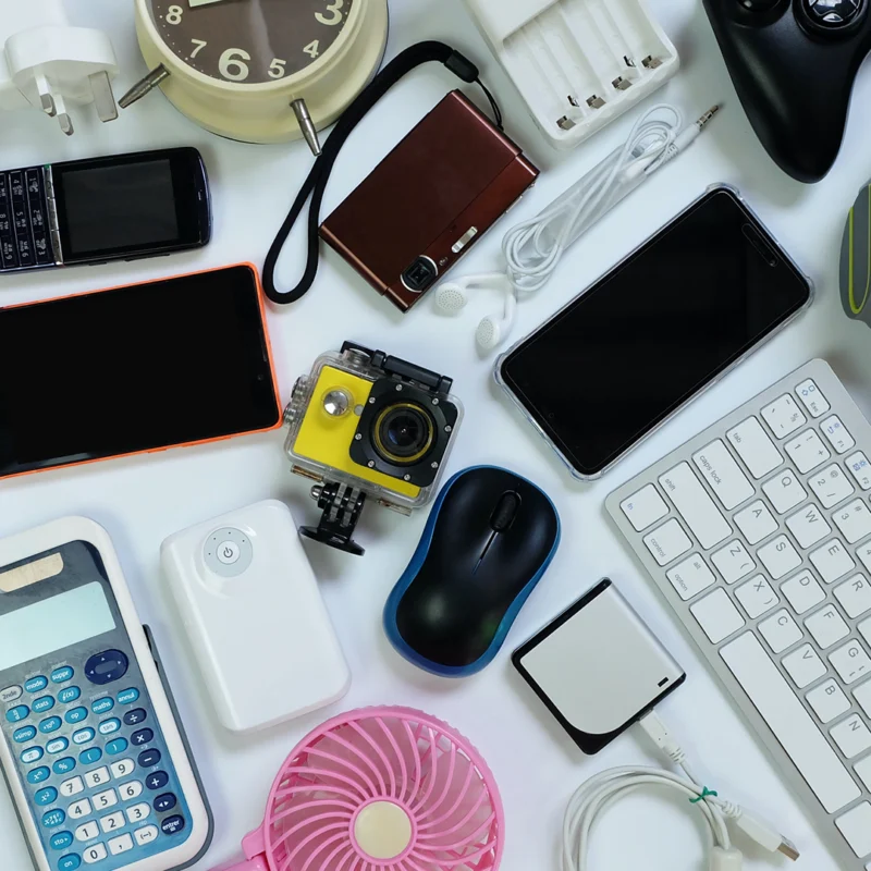 a collection of devices laid out flat on a table top