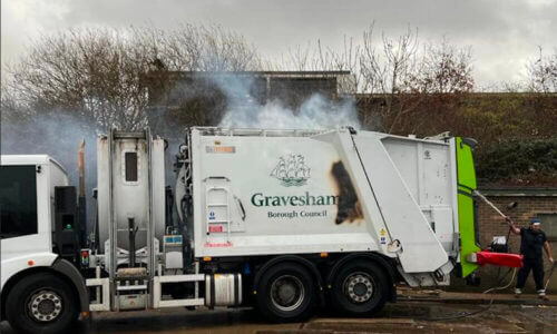A battery fire in a Gravesham Council bin lorry with plumes of smoke coming out of it