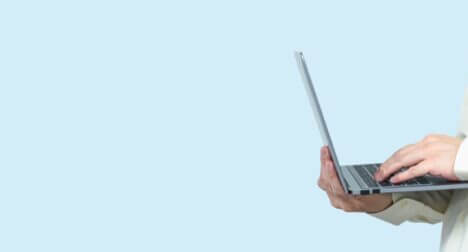 man with a laptop ready to audit their business electricals